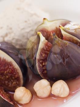 Royalty Free Photo of Roasted Figs with Hazelnut Cream