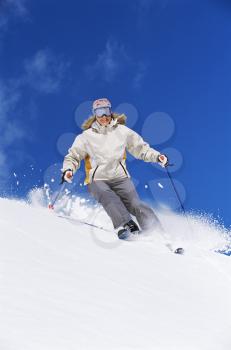Royalty Free Photo of a Skier Coming Downhill