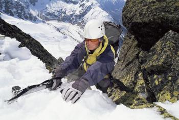 Royalty Free Photo of a Mountain Climber on a Snowy Mountain