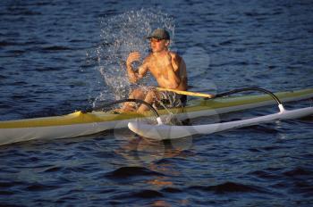 Royalty Free Photo of a Kayaker Splashing Water on His Face