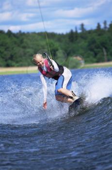 Royalty Free Photo of a Woman Water Skiing