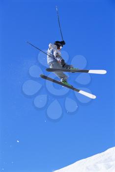 Royalty Free Photo of a Skier Doing a Jump