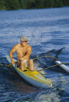 Royalty Free Photo of a Kayaker in Calm Waters