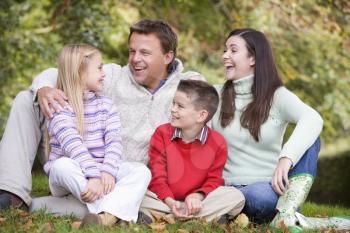 Royalty Free Photo of a Laughing Family Outside