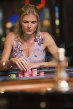 Royalty Free Photo of a Woman at a Roulette Table