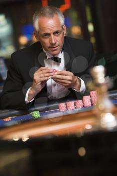 Royalty Free Photo of a Man at a Casino