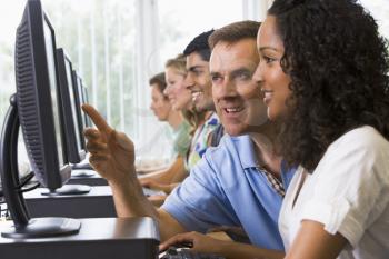 Royalty Free Photo of a Computer Class With the Teacher