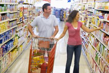 Royalty Free Photo of a Couple Grocery Shopping