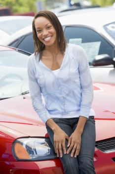 Royalty Free Photo of a Woman With a New Car