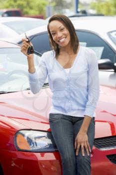 Royalty Free Photo of a Woman With the Keys to a New Car