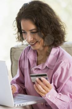 Royalty Free Photo of a Woman Making Purchases Online