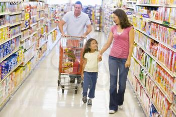 Royalty Free Photo of a Family Shopping in a Grocery Store