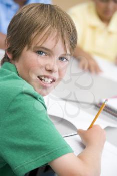 Royalty Free Photo of a Student Writing