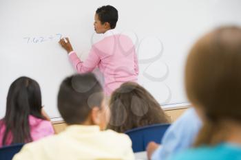 Royalty Free Photo of a Teacher in Math Class