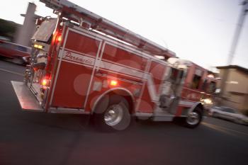 Royalty Free Photo of a Firetruck Rushing to a Fire