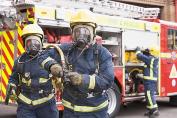 Royalty Free Photo of Firefighters Wearing Masks