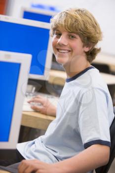 Royalty Free Photo of a Male Student in Computer Class