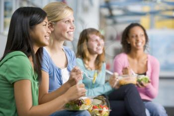Royalty Free Photo of Girls Having Lunch