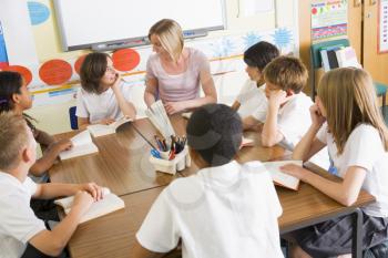 Royalty Free Photo of a Teacher and Students in Class
