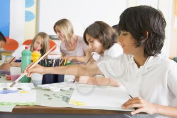 Royalty Free Clipart Image of Students in Art Class