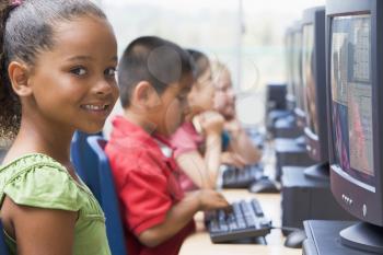 Royalty Free Photo of Little Children at Computers