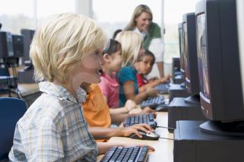 Royalty Free Photo of Children at Computers