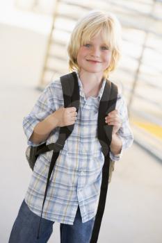 Royalty Free Photo of a Boy With a Backpack