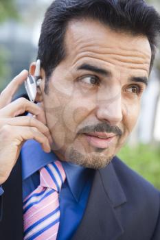 Royalty Free Photo of a Businessman With a Cellphone