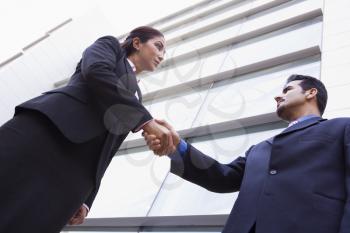 Royalty Free Photo of Two Businesspeople Shaking Hands