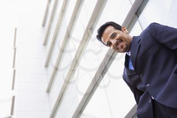 Royalty Free Photo of a Man Outside a Building
