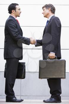 Royalty Free Photo of Two Businessmen Shaking Hands