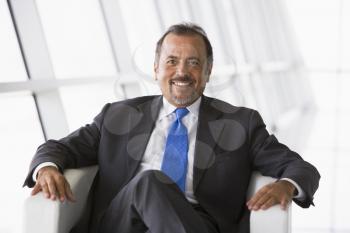 Royalty Free Photo of a Businessman in a Chair
