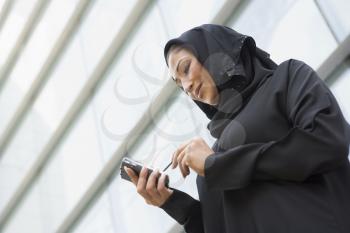 Royalty Free Photo of an Arab Woman With a Cellphone