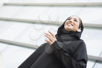 Royalty Free Photo of an Middle Eastern Woman With a Cellphone