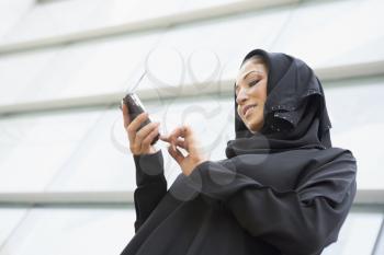 Royalty Free Photo of a Woman Texting