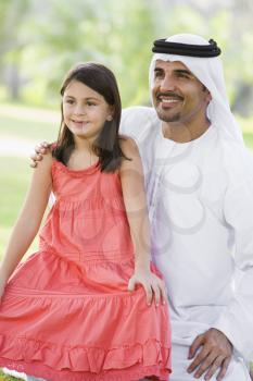 Royalty Free Photo of a Man and Daughter Outside