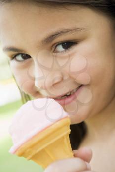 Royalty Free Photo of a Little Girl With an Ice Cream Cone