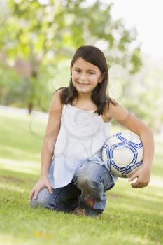 Royalty Free Photo of a Girl With a Soccer Ball