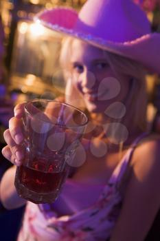 Royalty Free Photo of a Girl in a Bar