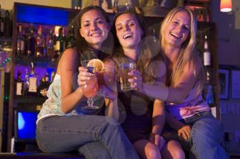 Royalty Free Photo of Young Women in a Bar