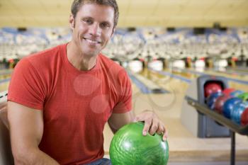 Royalty Free Photo of a Man at a Bowling Alley