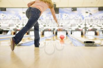 Royalty Free Photo of a Woman Bowling