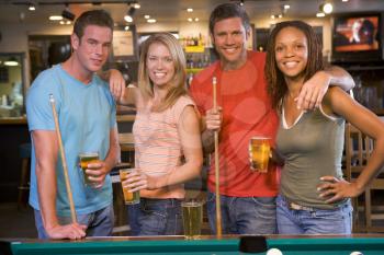 Royalty Free Photo of Friends at the Pool Hall