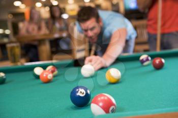 Royalty Free Photo of a Man Playing Pool