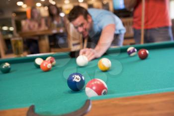 Royalty Free Photo of a Man Playing Pool