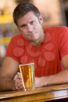 Royalty Free Photo of a Man Having a Beer