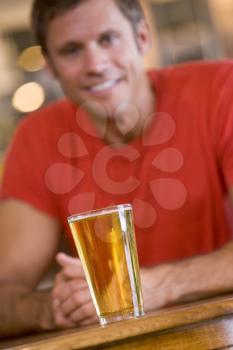 Royalty Free Photo of a Man Having a Glass of Beer