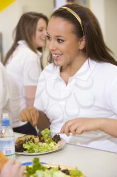 Royalty Free Photo of a Student in a Cafeteria