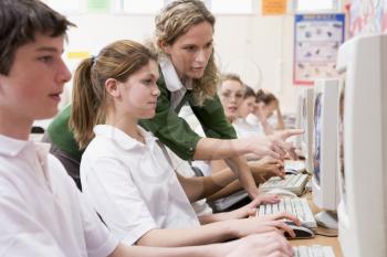 Royalty Free Photo of Students in a Computer Class