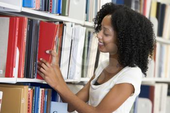Royalty Free Photo of a Girl in a Library